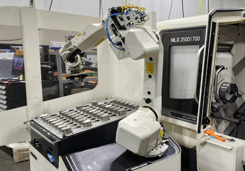 Automated 5-axis CNC manufacturing cell with robotic loading